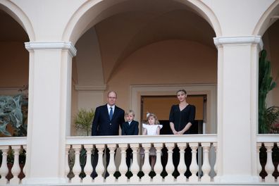 The family viewed the festivities from the palace balcony.