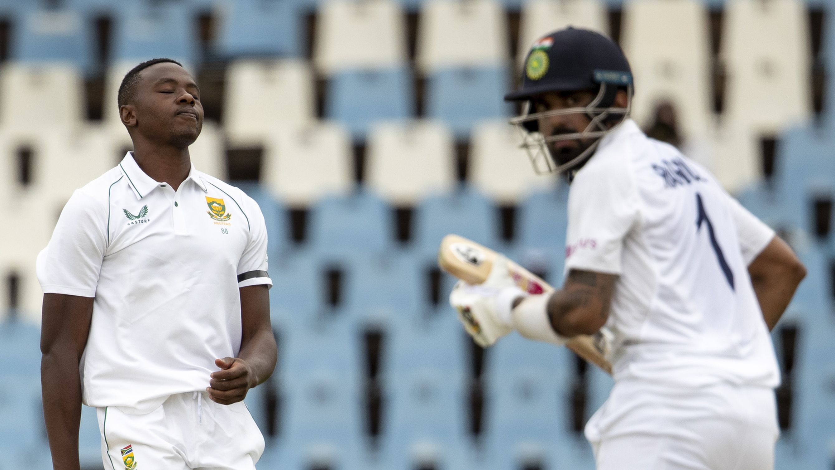 South Africa&#x27;s Kagiso Rabada, left, reacts after runs are scored by India&#x27;s KL Rahul.