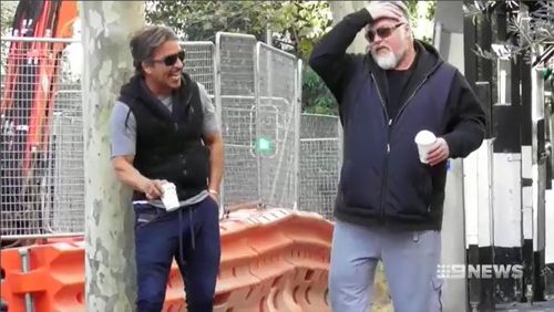 Despite looking relaxed with close friend and media personality Kyle Sandilands, John Ibrahim has demanded his lawyer challenge a firearms prohibition order. Picture: 9NEWS.