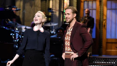 Emma Stone appears alongside host Ryan Gosling during the opening monologue for "Saturday Night Live". (AP)