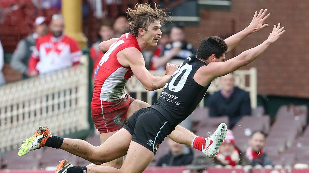 Swans thrash Port by 67 points in AFL