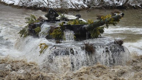 Handout photos of the Polish Defense Ministry shows Leopard 2A4 tanks at the military rest range in Zagan, Poland.