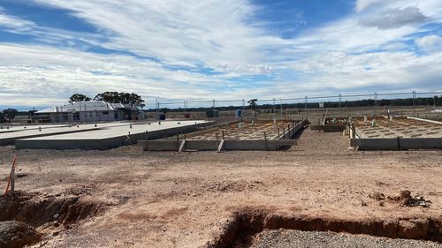 Kim Gibson's townhouse was framed up with the slab almost ready to pour when work suddenly stopped on the project.