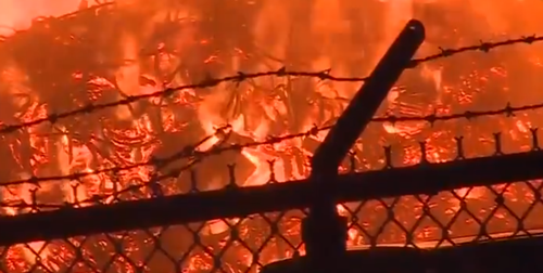 An intense blaze at a Jim Beam warehouse in Kentucky has sent flames flying into the night sky.