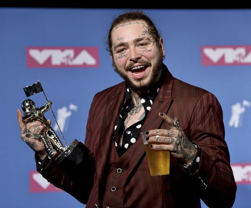 Rapper Post Malone's jet blows two tires but then lands safely