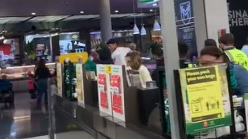 The alleged offender inside the Merrylands Woolworths store.