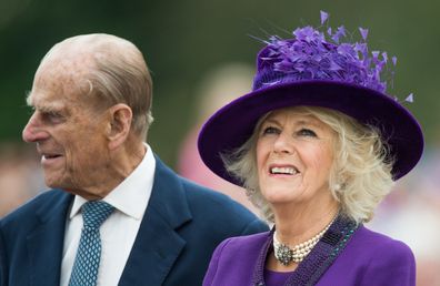 Camilla, Duchess of Cornwall and Prince Philip, Duke of Edinburgh tour Queen Mother Square on October 27, 2016 in Poundbury, Dorset. 