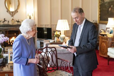 Queen Elizabeth presents Thomas Trotter with the Queen's Medal for Music