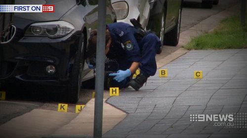 The gunman left his fingerprints on a car bonnet as he made his getaway. (9NEWS)