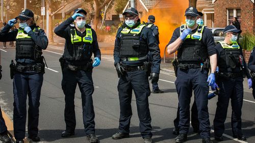 Melbourne, Australia. 5th Aug, 2021. Police give chase to protesters up Collins  Street during a snap protest called on the eve of the 6th lockdown to be  imposed on Melbourne. Hardcore anti-lockdown