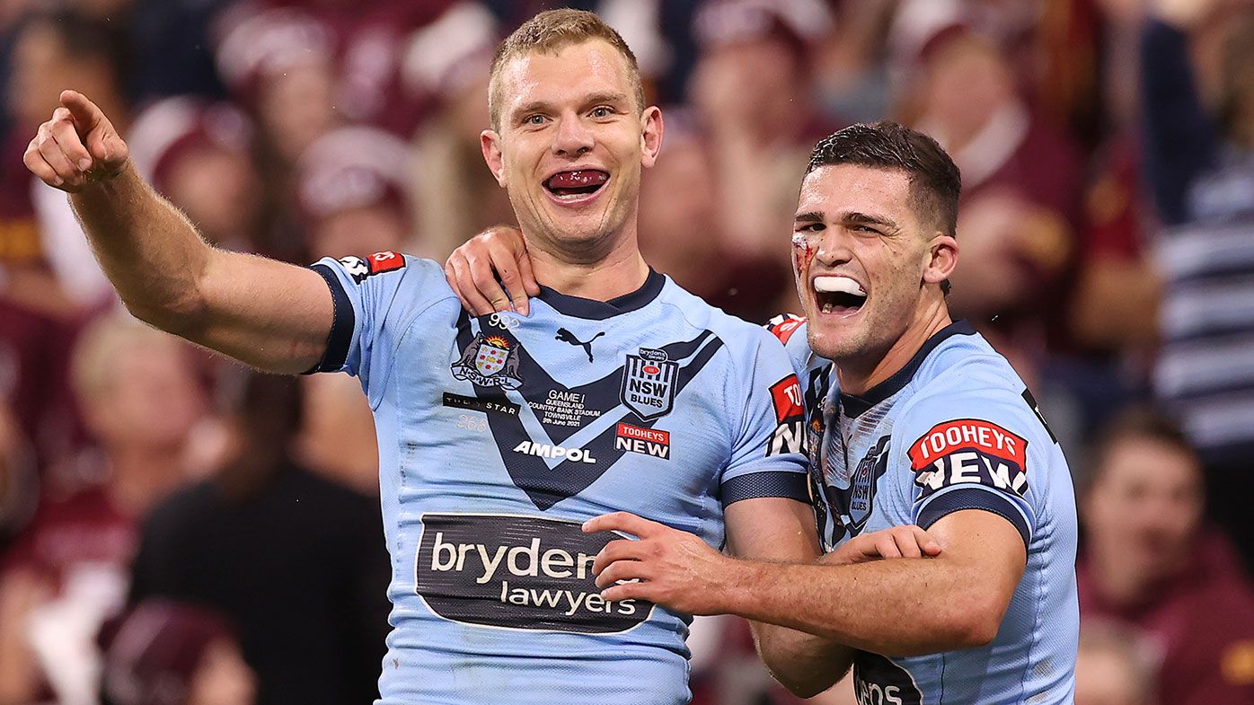 Tom Trbojevic of the Blues and Nathan Cleary of the Blues celebrate after scoring a try during game one of the 2021 State of Origin series between the New South Wales Blues and the Queensland Maroons at Queensland Country Bank Stadium on June 09, 2021 in Townsville, Australia. (Photo by Mark Kolbe/Getty Images)