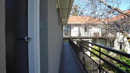 Security for each room is simple, with a keyed lock on door handles and a chained door lock. (Booking.com)