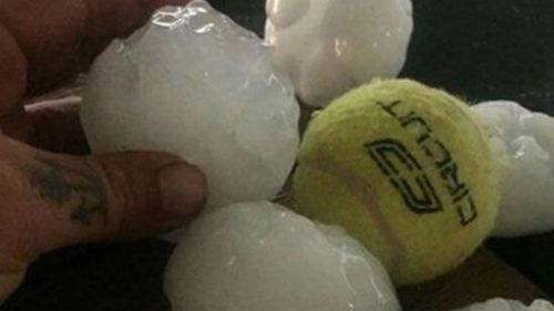 Hail stones the size of tennis balls pelted homes and windows in Woodford yesterday. (Higgins Storm Chasing)