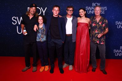 (L-R) Travis Fimmel, Felix Cameron, Lee Tiger Halley, Simon Baker, Phoebe Tonkin and Bryan Brown attend the Netflix global premiere of "Boy Swallows Universe" at New Farm Cinemas on January 09, 2024 in Brisbane 