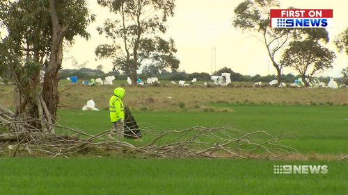 Cleanaway staff were forced to clean up the flyaway rubbish.