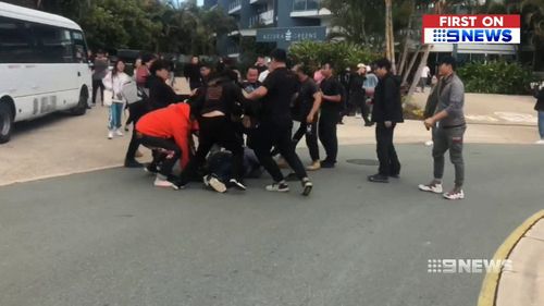 Fans and a film crew clashed outside the Gold Coast hotel.