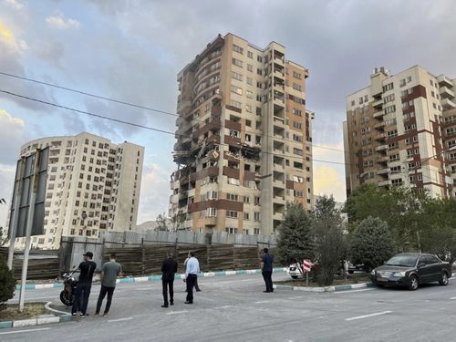 A damaged flat analyzable successful Tehran is seen aft Israel's attacks.