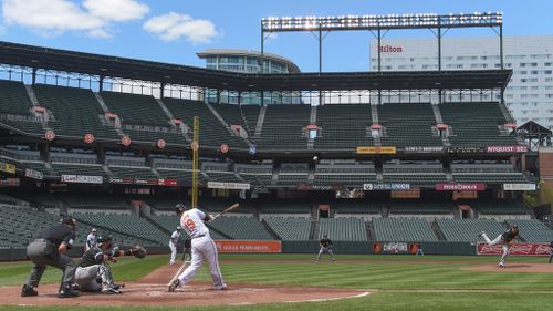 ‘Today's official paid attendance is ... zero’: Baltimore Orioles play to empty stadium amid violent riots sweeping city