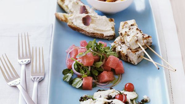 Taramasalata toast (pictured with school prawn saganaki, swordfish kebabs with watermelon salad and crab salad with cherry tomatoes and capers)