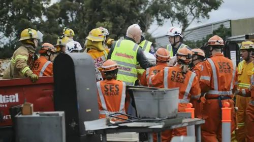 Firefighters and SES workers freed the man. (9NEWS)