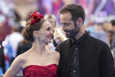 Natalie Portman, left, and Benjamin Millepied pose for photographers upon arrival at the screening of the film 'Thor: Love and Thunder in London Tuesday, July 5, 2022. (AP Photo/Scott Garfitt)
