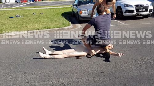 The off-duty officer held down the 34-year-old offender until police arrived. (9NEWS)