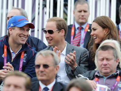 Peter Phillips, Prince William, Duke of Cambridge and Catherine, Duchess of Cambridge look on during the Show Jumping Eventing Equestrian on Day 4 of the London 2012 Olympic Games at Greenwich Park on July 31, 2012 in London, England.