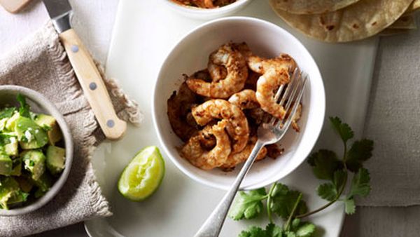 Soft prawn tacos with coleslaw, avocado and coriander