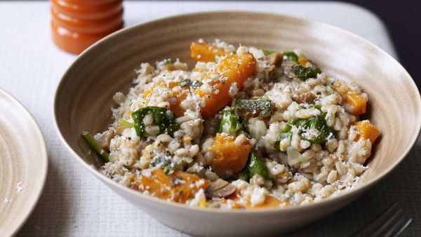 Spelt risotto with butternut pumpkin, spinach, chestnuts and goat's cheese. Image: Kyle Books