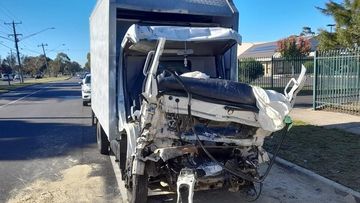 truck hits bridge wall