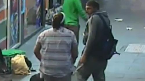 The man in the grey hoodie is believed responsible for the attack. (Victoria Police)