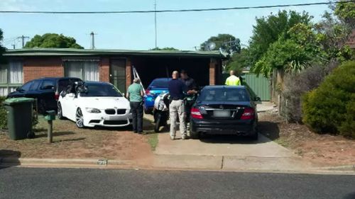 Five arrested and firearms, stolen cars seized in Victorian bikie raids