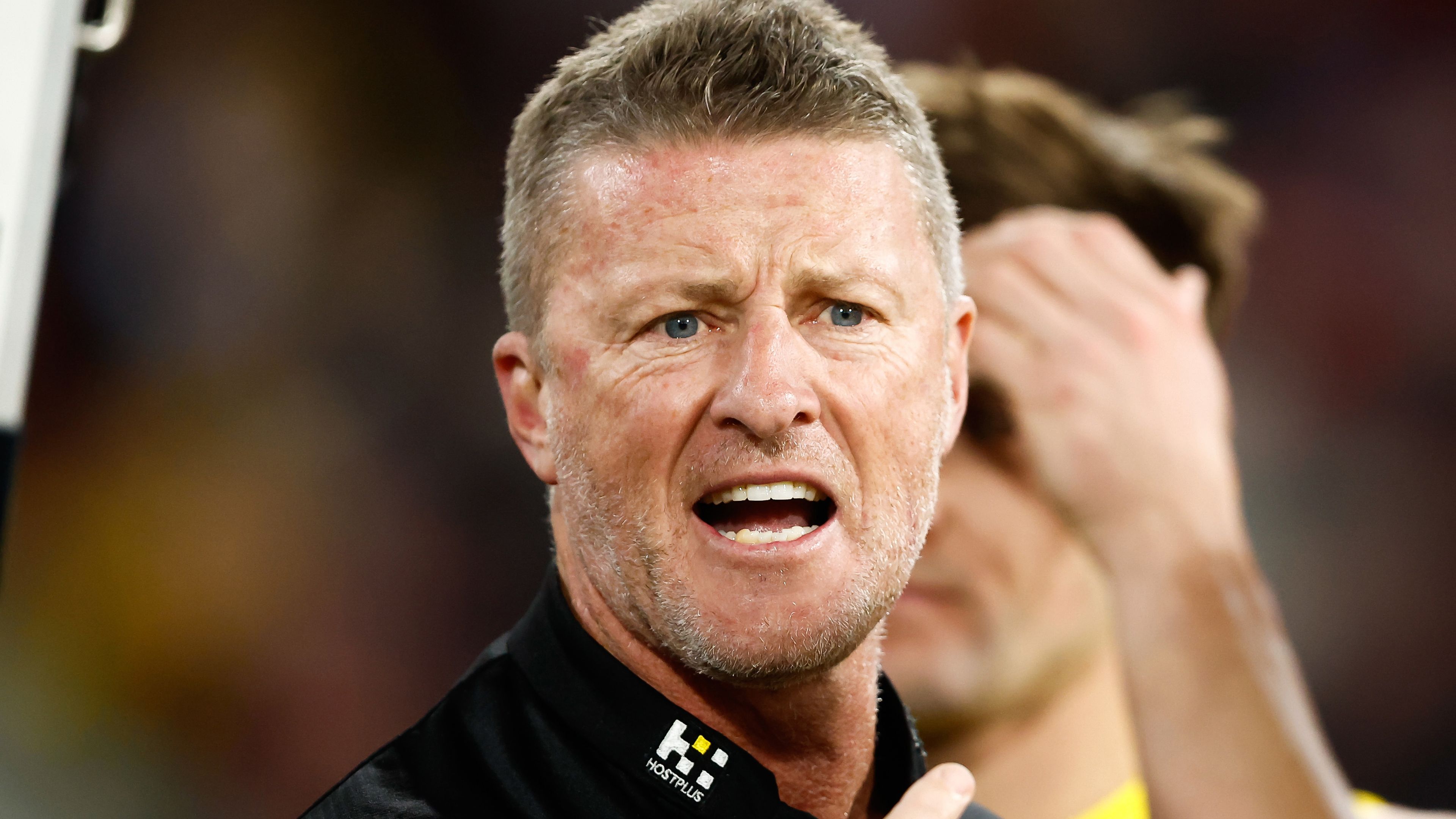 MELBOURNE, AUSTRALIA - MAY 20: Damien Hardwick, Senior Coach of the Tigers addresses his players during the 2023 AFL Round 10 match between the Essendon Bombers and the Richmond Tigers at the Melbourne Cricket Ground on May 20, 2023 in Melbourne, Australia. (Photo by Dylan Burns/AFL Photos)