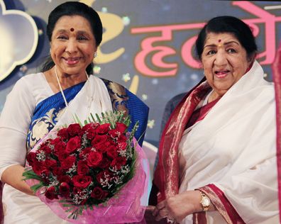 Lata Mangeshkar and her sister Asha Bhosle