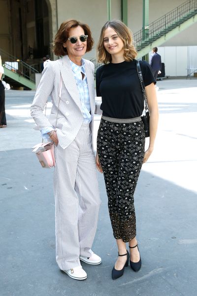 Former Chanel muse Ines de la Fressange and her daughter Violette d'Urso at the Chanel haute couture show in Paris.