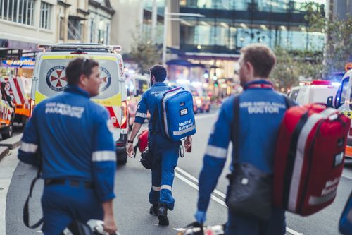 Paramedics and doctors continue to walk into Westfield Bondi Junction