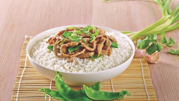 Chinese garlic and ginger pork with rice and snow peas