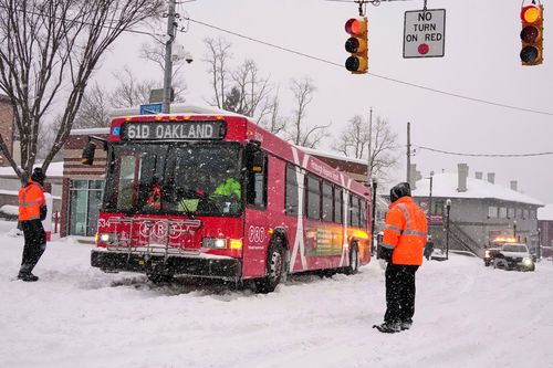 A Pittsburgh Regional Transit bus is stuck on Murray Ave. in the Squirrel Hill neighborhood of Pittsburgh during a winter storm Sunday, Jan. 25, 2026.