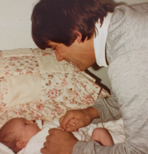 Boyle as a baby with her father. 