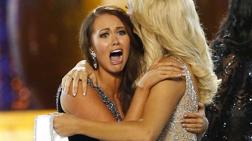 Cara Mund is overcome with emotion upon winning her tiara.