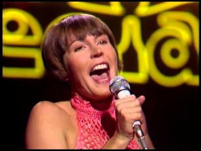 Helen Reddy singing I Am Woman.