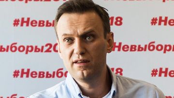 Russian liberal opposition leader and a head of an anti-corruption foundation, Alexei Navalny, calls on the public to ignore president elections. (AAP)