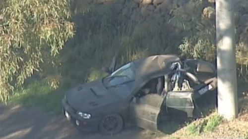 The young man was left for dead in the crashed Subaru. (9NEWS)