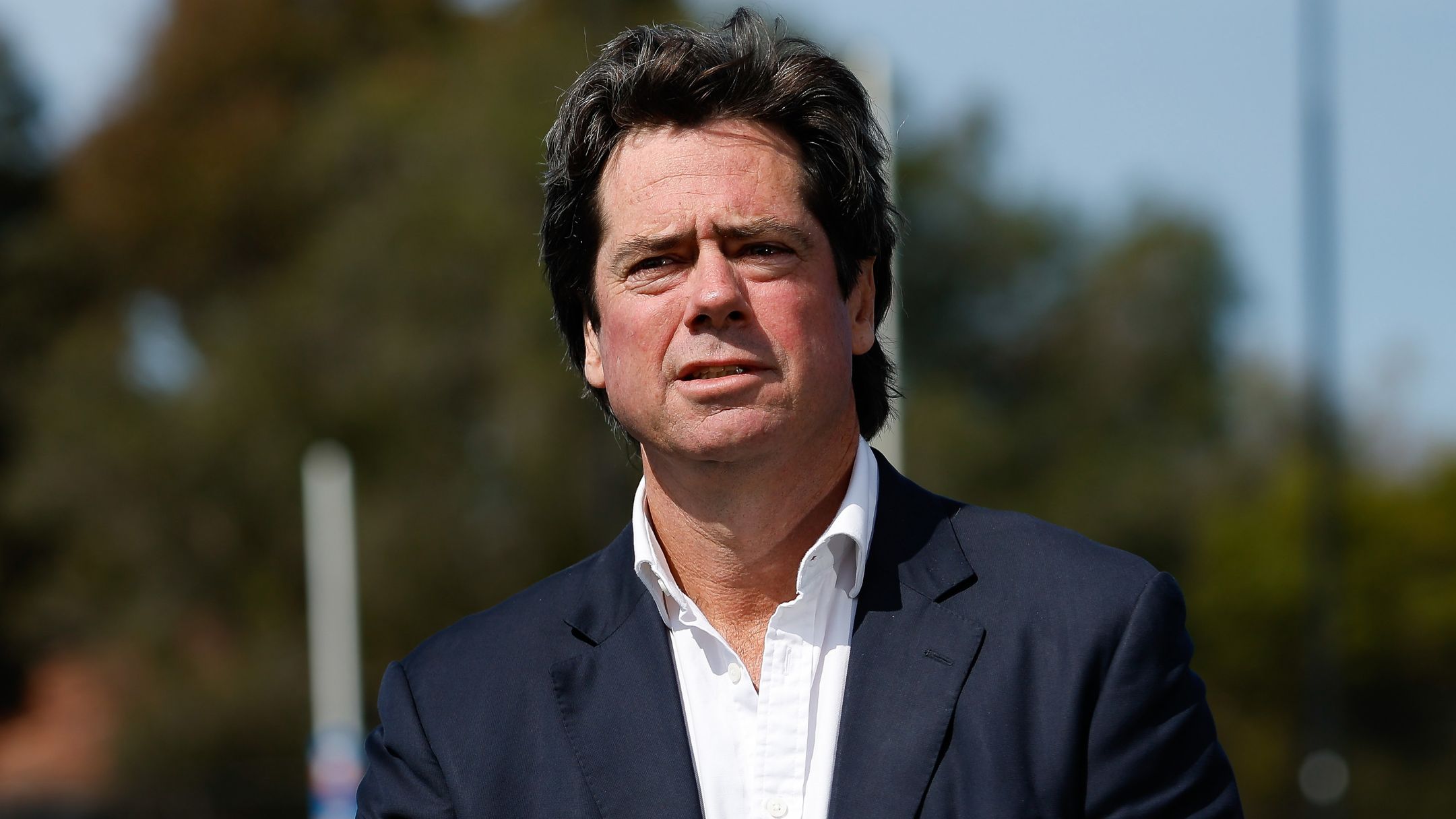 MELBOURNE, AUSTRALIA - SEPTEMBER 14: Gillon McLachlan, Chief Executive Officer of the AFL speaks to the media during the launch of the Telstra Footy Country Grants media opportunity at Yarraville Oval on September 14, 2023 in Melbourne, Australia. (Photo by Dylan Burns/AFL Photos via Getty Images)