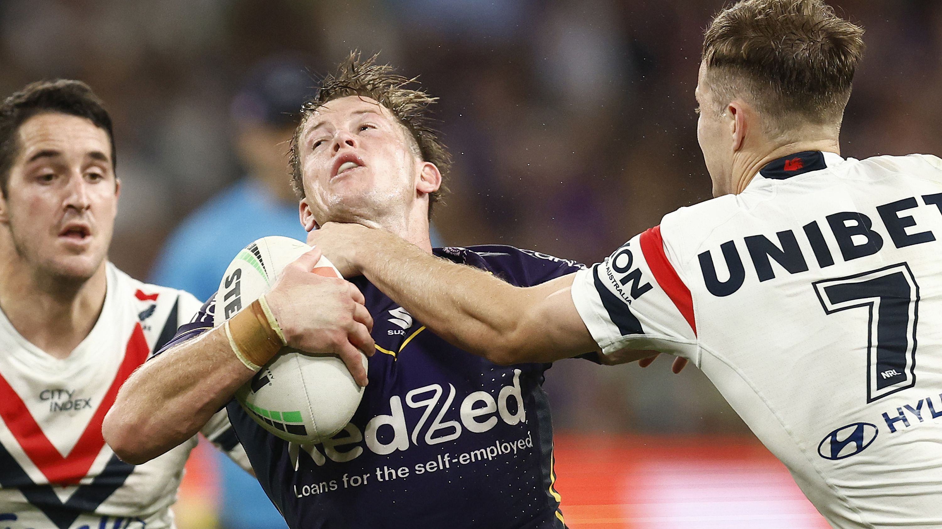 Harry Grant of the Storm is tackled by Sam Walker of the Roosters during the NRL Semi Final match between Melbourne Storm and the Sydney Roosters at AAMI Park on September 15, 2023 in Melbourne, Australia. (Photo by Daniel Pockett/Getty Images)