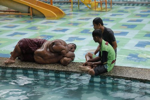 Arya Permana at a waterpark in Karawang, West Java, Indonesia, March 2017 (Channel 5 / Barcroft Productions / Barcroft Media via Getty Images)