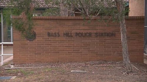 The 16-year-old was waiting outside Bass Hill police station yesterday afternoon when she was allegedly threatened with a knife. (9NEWS)