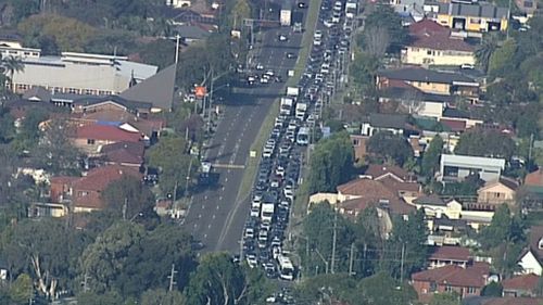 Traffic backed up for 8km after water main bursts in Macquarie Park