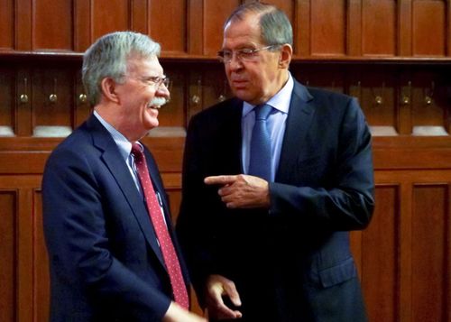 US National Security Adviser John Bolton, left, and Russian Foreign Minister Sergei Lavrov in Moscow.