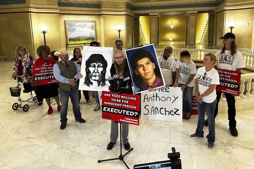 The Rev. Jeff Hood and supporters of Oklahoma death row inmate Anthony Sanchez proclaim his innocence during a news conference at the Oklahoma Capitol in Oklahoma City, May 25, 2023.  